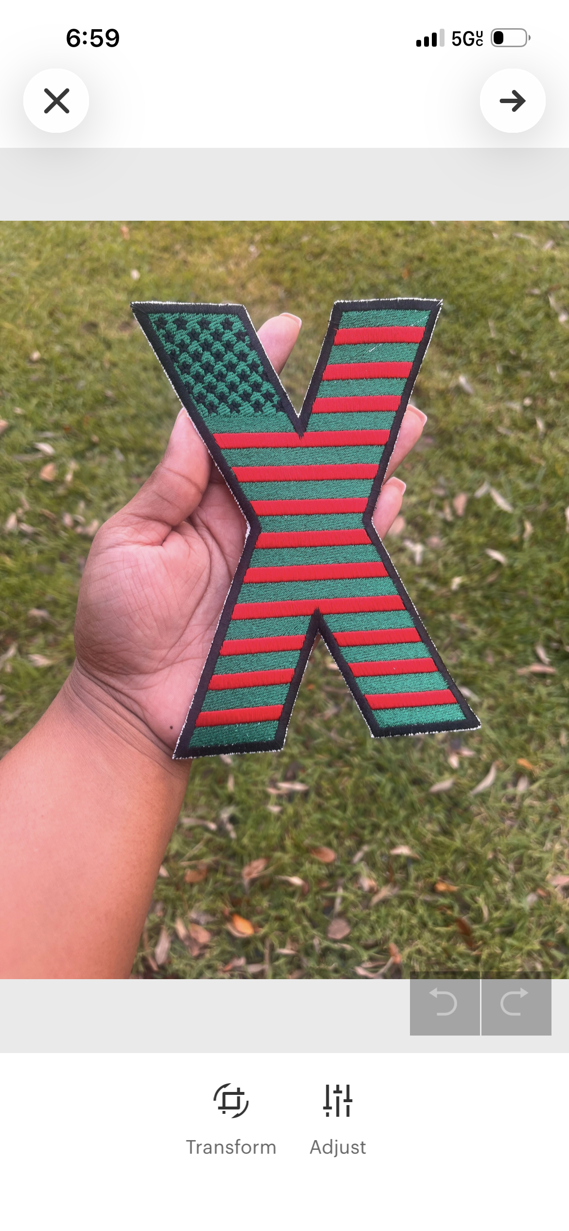 Revolutionary embroidered X