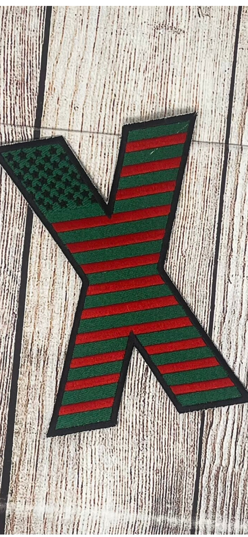 Revolutionary embroidered X