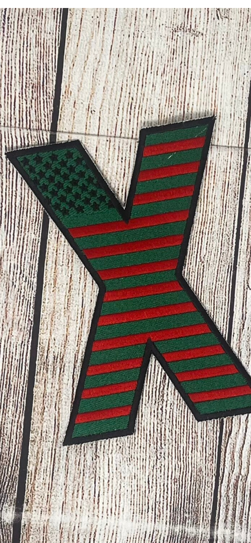 Revolutionary embroidered X