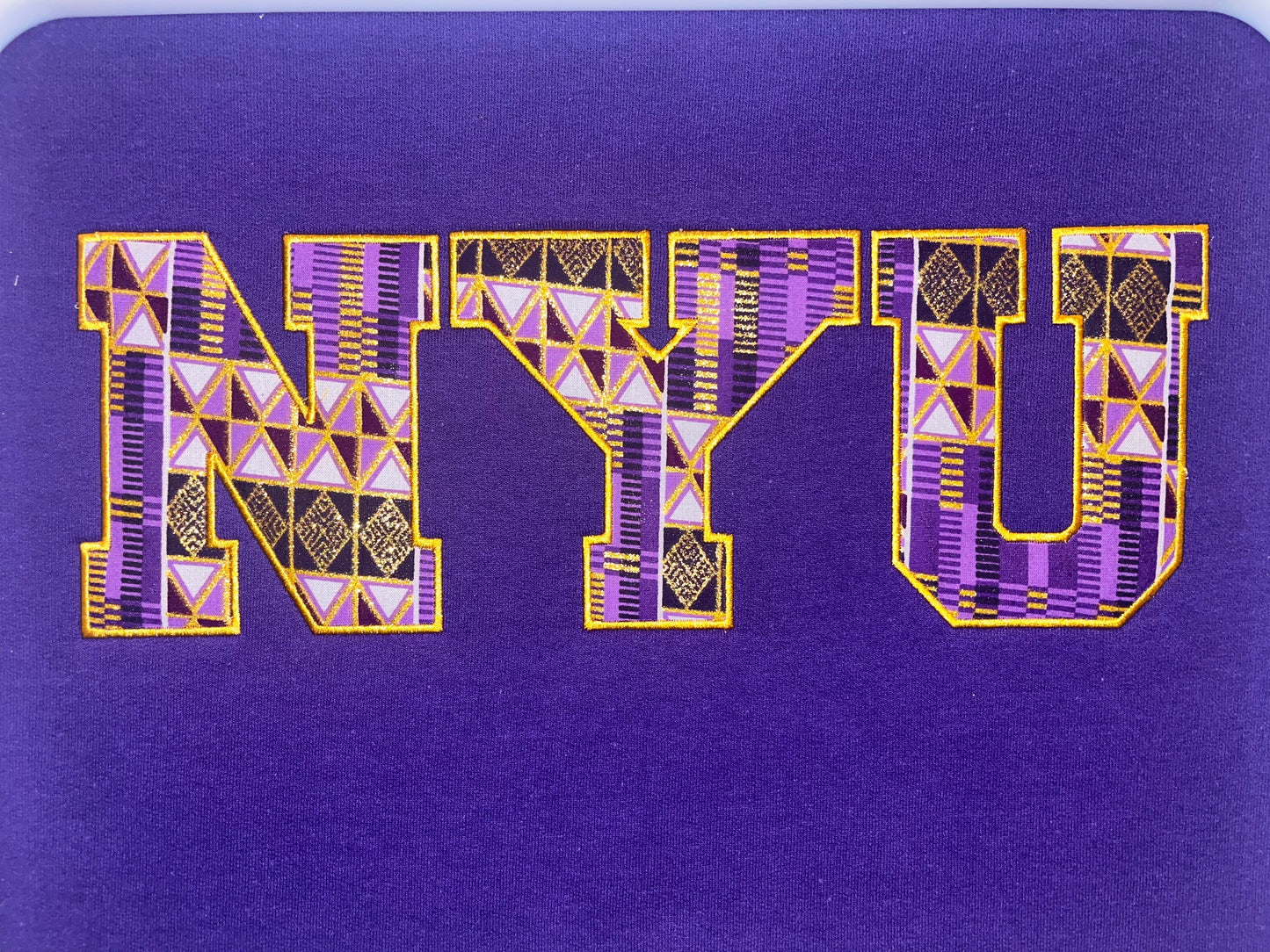 NYU Purple Kente Sweatshirt
