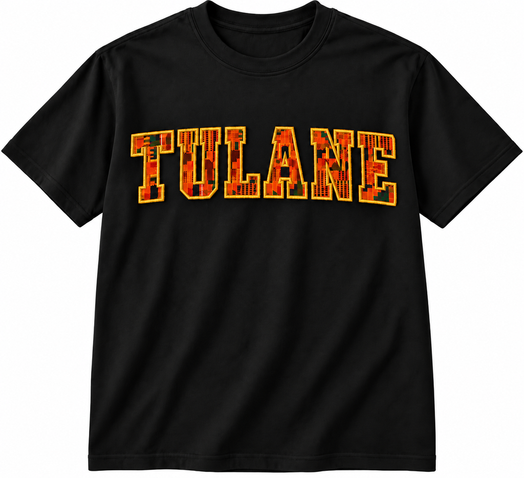 A black short-sleeve crewneck t-shirt featuring the word 'TULANE' printed across the chest in a bold, blocky font filled with a red, orange, and yellow flame pattern and outlined in yellow.